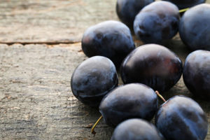 concord grapes on a table