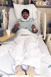 Osvaldo Ramirez recovering in hospital bed