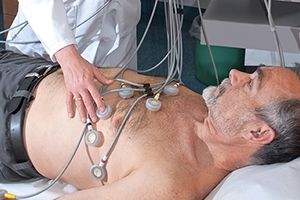 Male patient receiving an EKG test.