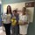 Photo of Jean Sumortin, accepting her Sunflower Award from (L) Stacy Neill, the patient’s mother who nominated her, and (R) Joanne Leigh, Director of Laboratory Services.