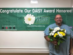 Don Zimmerman, RN accepts the DAISY Award